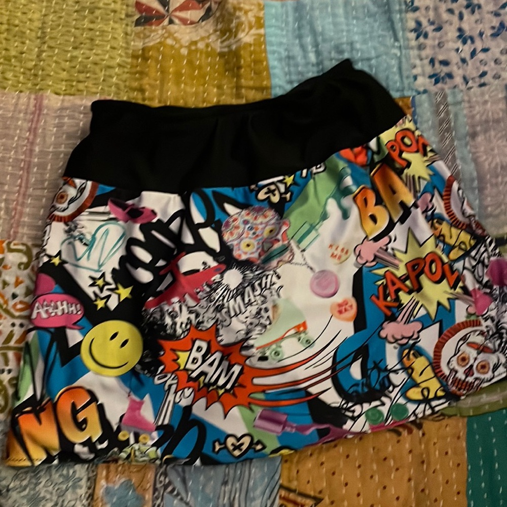 SkirtSport running skirt in a collage comic print XS, gently used, no pilling
